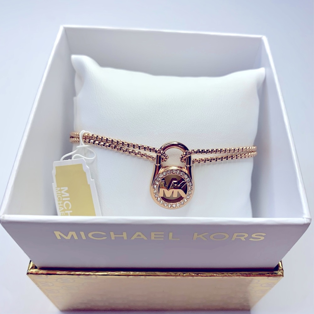 Michael KORS Slider Bracelet - Padlock Crystal Halo Surrounds MK Logo Gold Tone